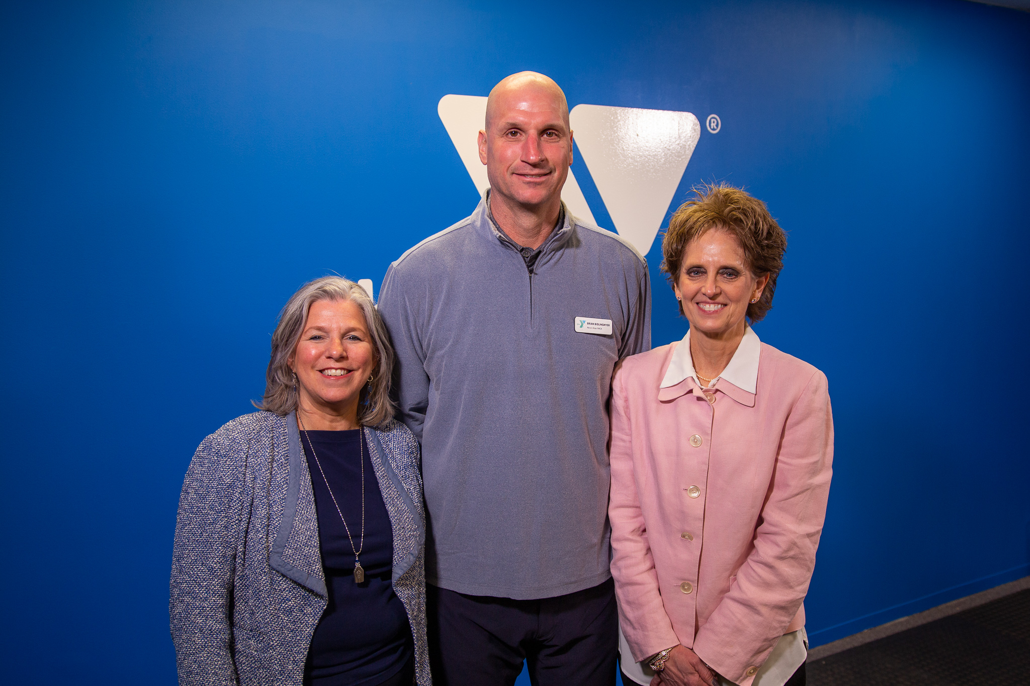 Domestic Relations Judge Katarina Cook and Magistrate Cheryl Wear pictured with the Akron Area YMCA’s Chief Development Officer Brian Bidlingmyer